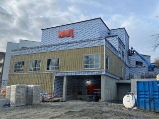 Red Fish Healing Centre siding under construction