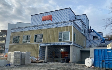 Red Fish Healing Centre siding under construction
